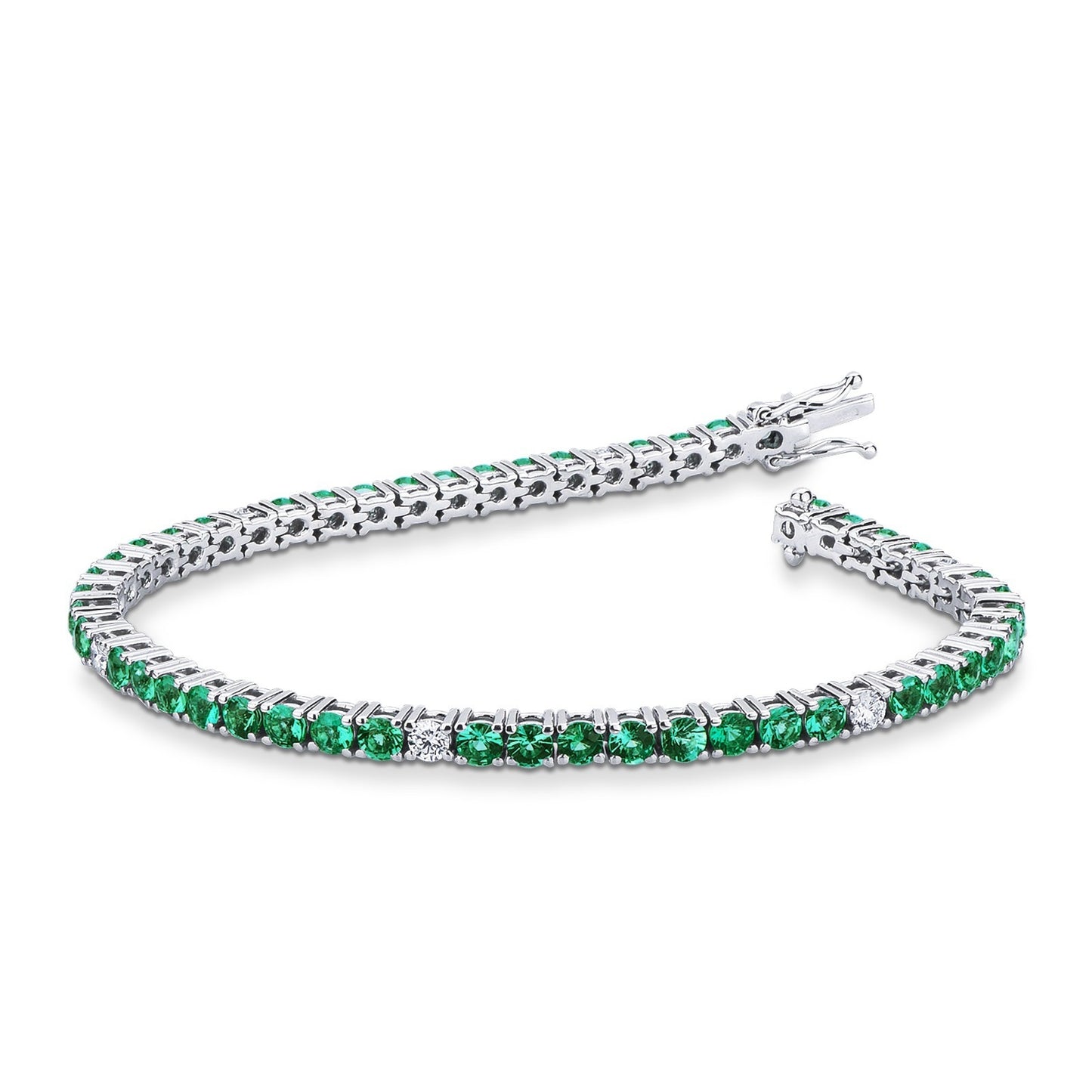 Bracciale tennis filo in oro bianco 18k con smeraldi e diamanti